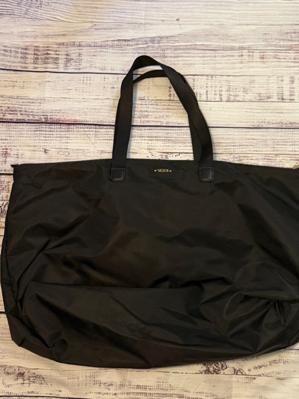 Tumi Overnight bag with Luggage sleeve Black